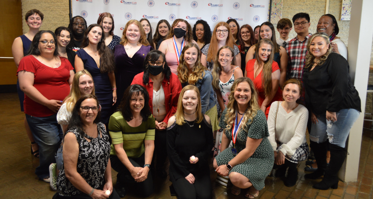 Atlantic Cape's new Phi Theta Kappa Honor Society members gather for a photo after the induction ceremony May 3 at the Walter Edge Theater.