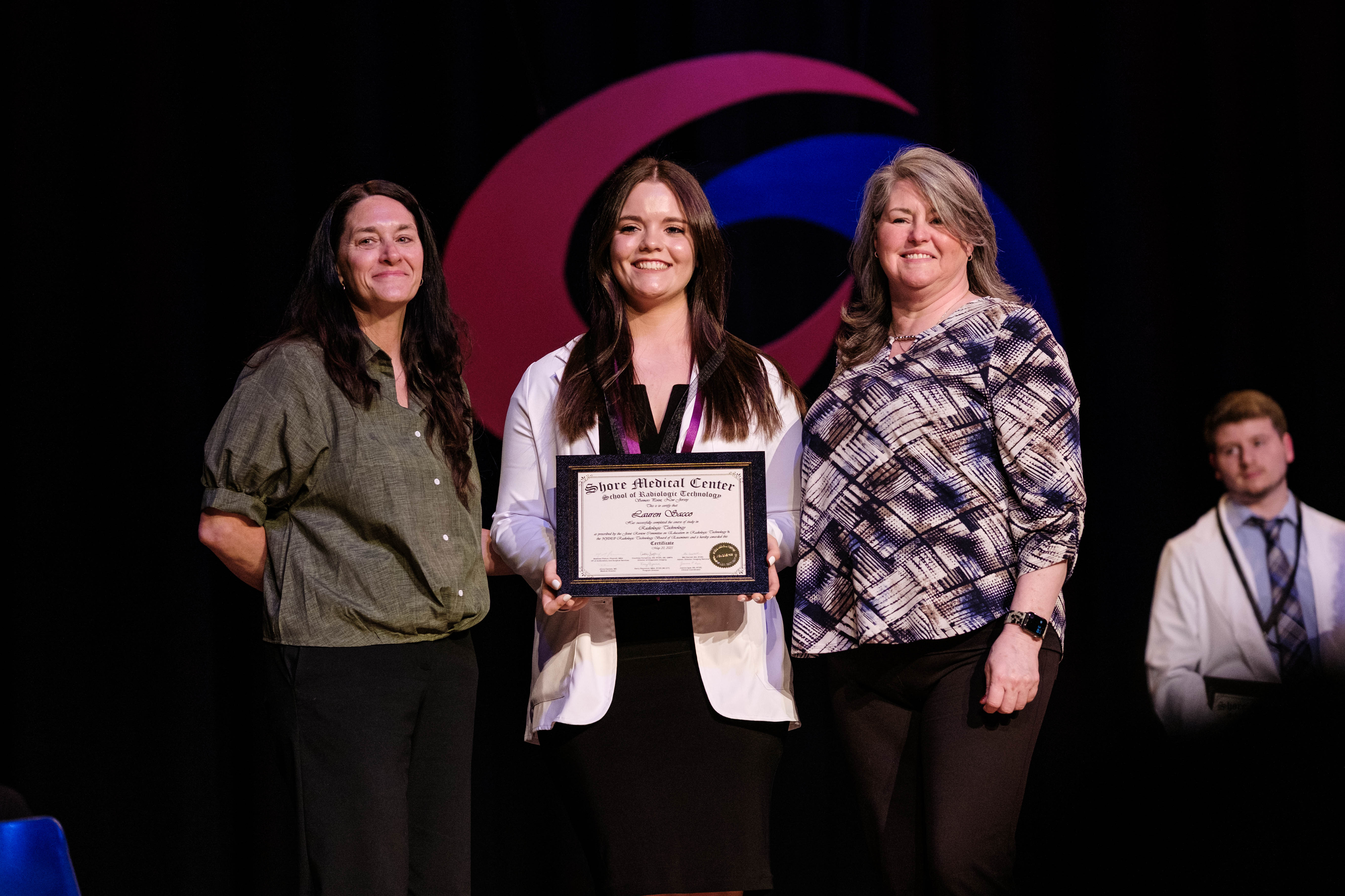 Radiologic Tech graduate Lauren Sacco receives her certificate
