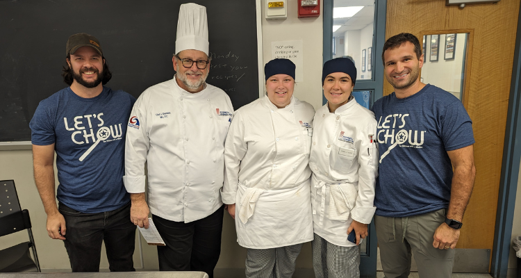 Winning team members Isabella Burke and Grace Carpenter with owners of Let's Chow and Culinary Director Joseph Sheridan