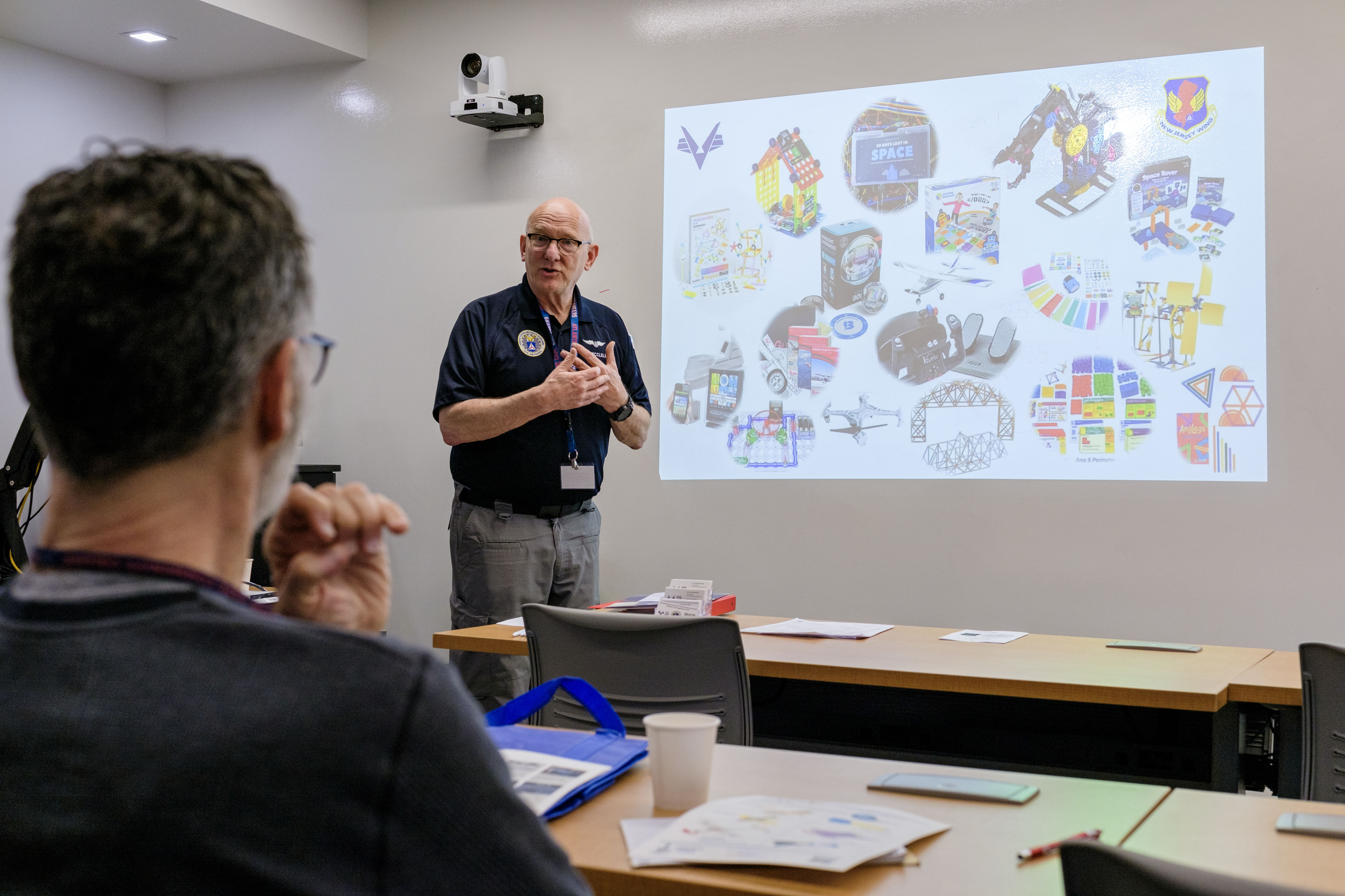 Educator speaking to a group during workshop