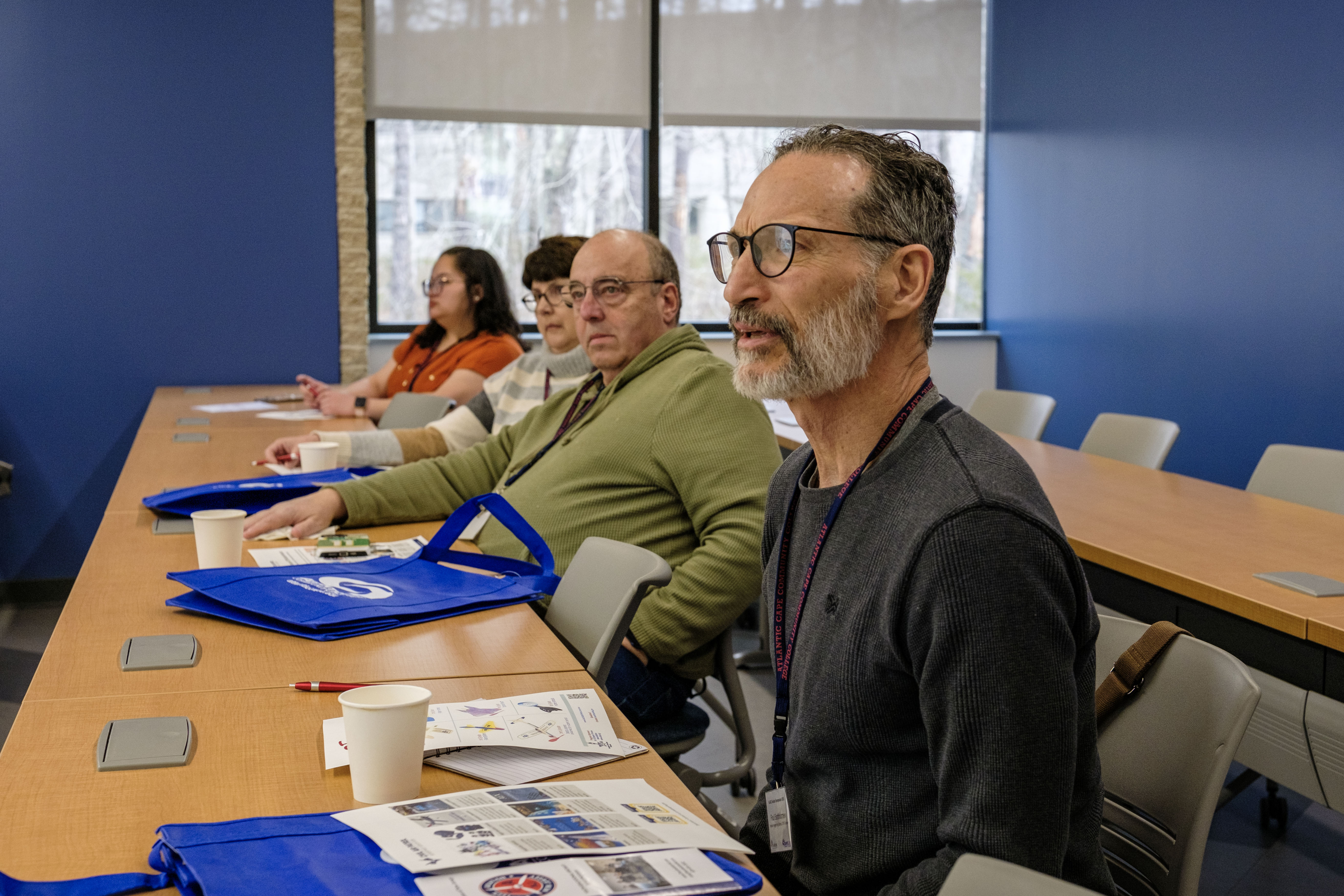 Attendees listen during a workshop session