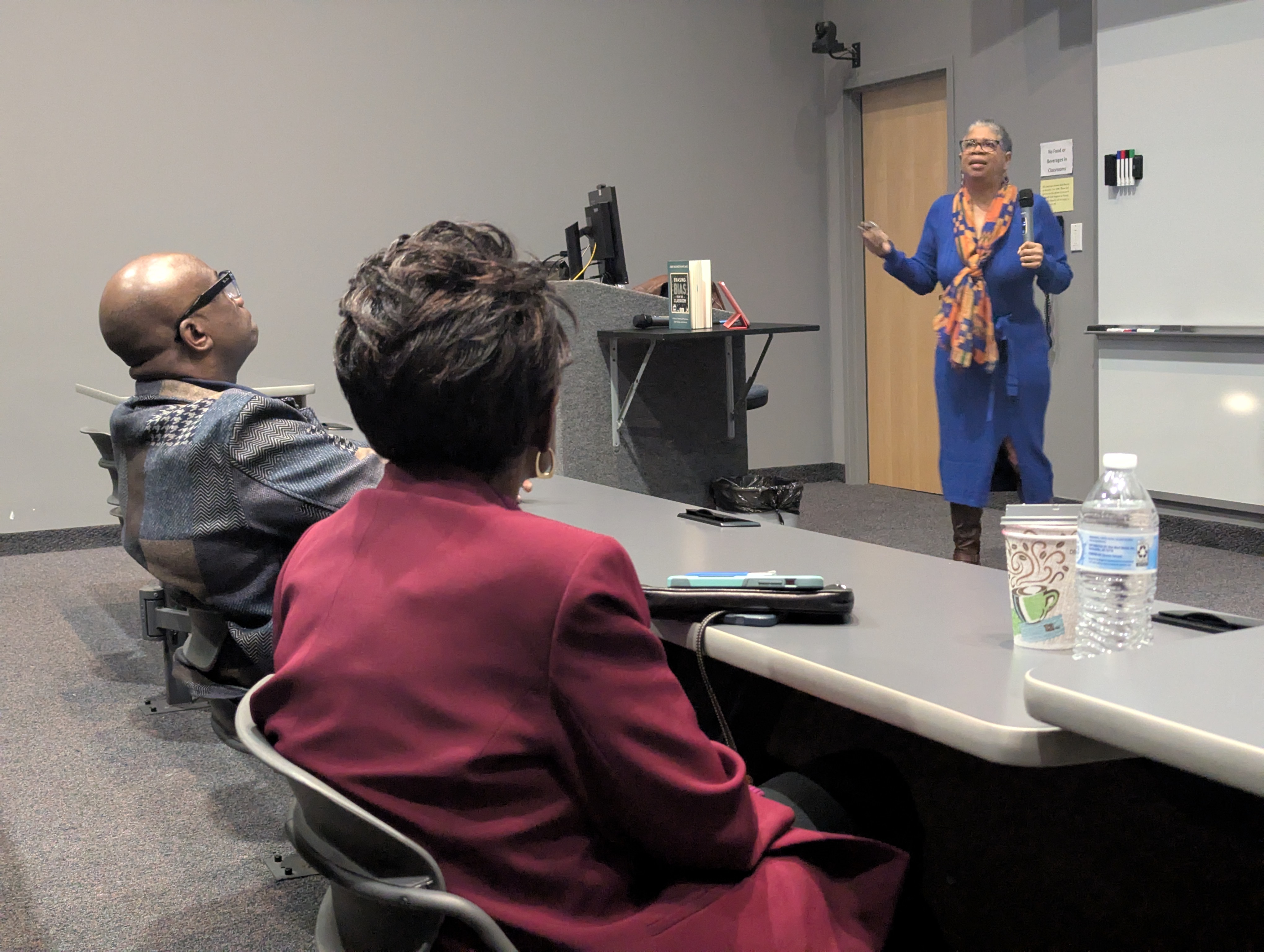 Audience listens to Janis Washington White speak