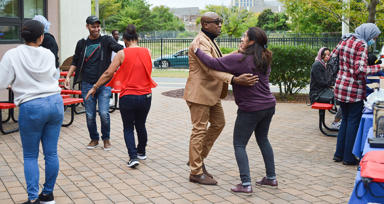 Attendees of the Hispanic Heritage Celebration dancing