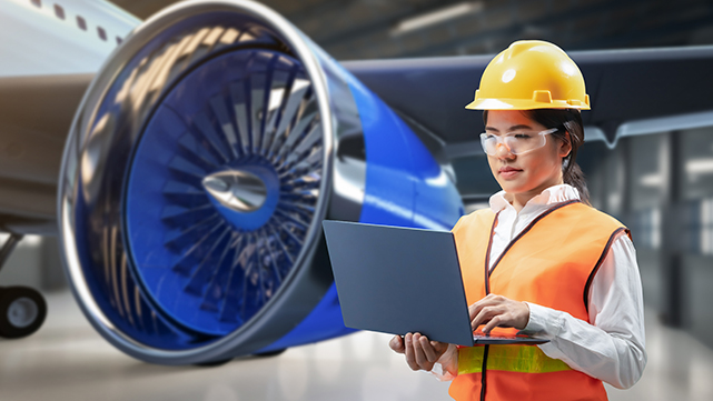 Women working on a jet engine.