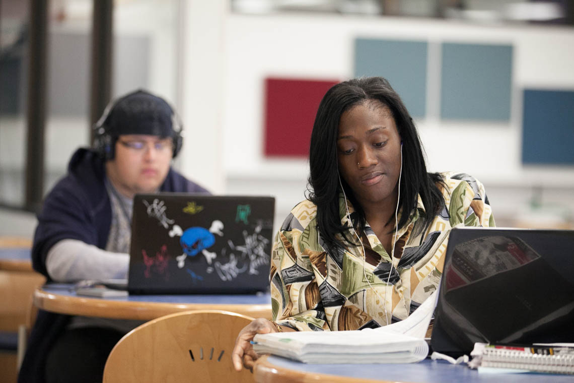 students studying in library