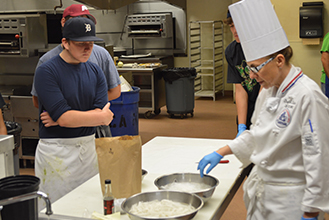 Preparing a meal in workshop 