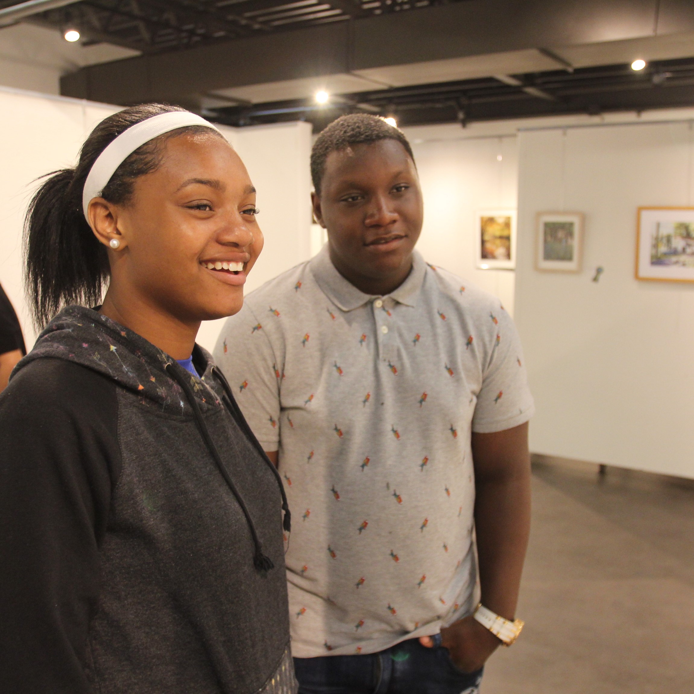 People viewing artwork