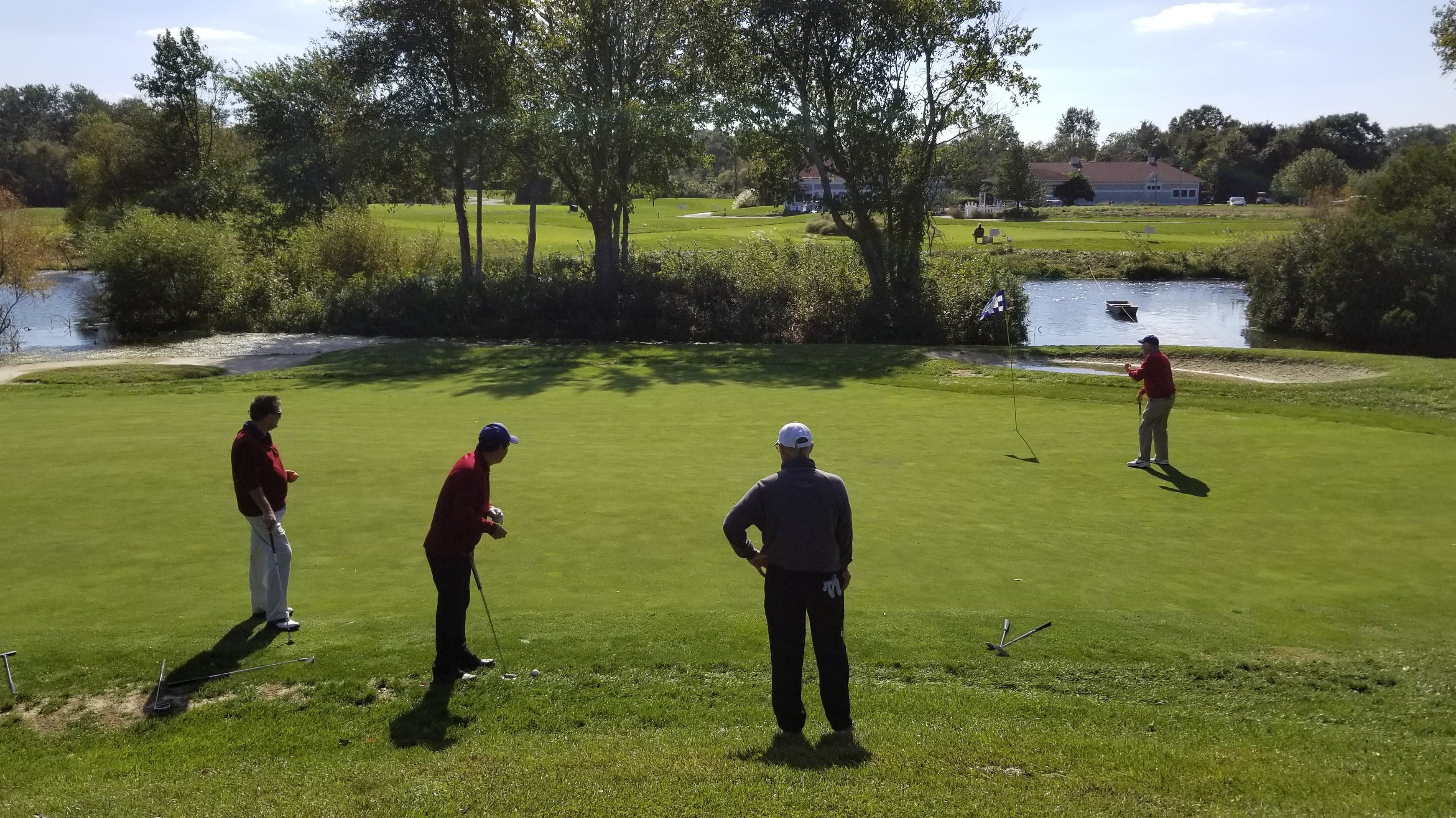 Men playing golf