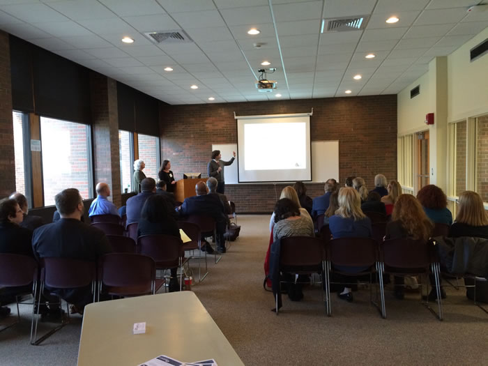 professors presenting at conference