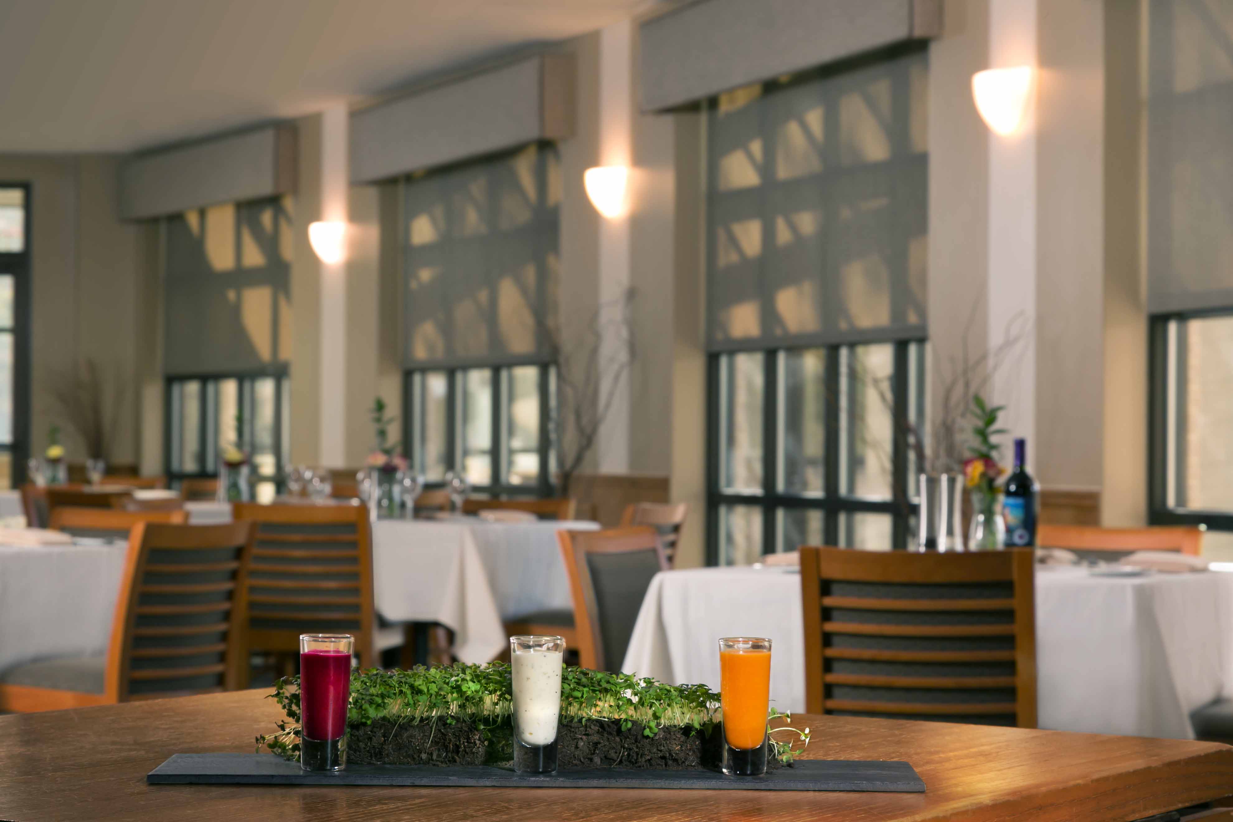 three glasses sitting inside restaurant
