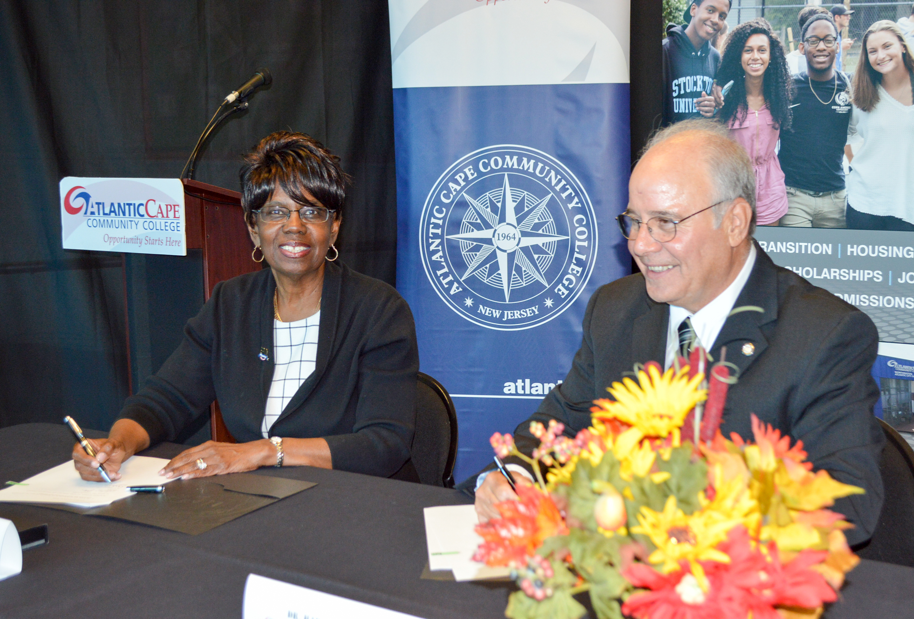 Dr. Barbara Gaba and Dr. harvey Kesselman signing agreement