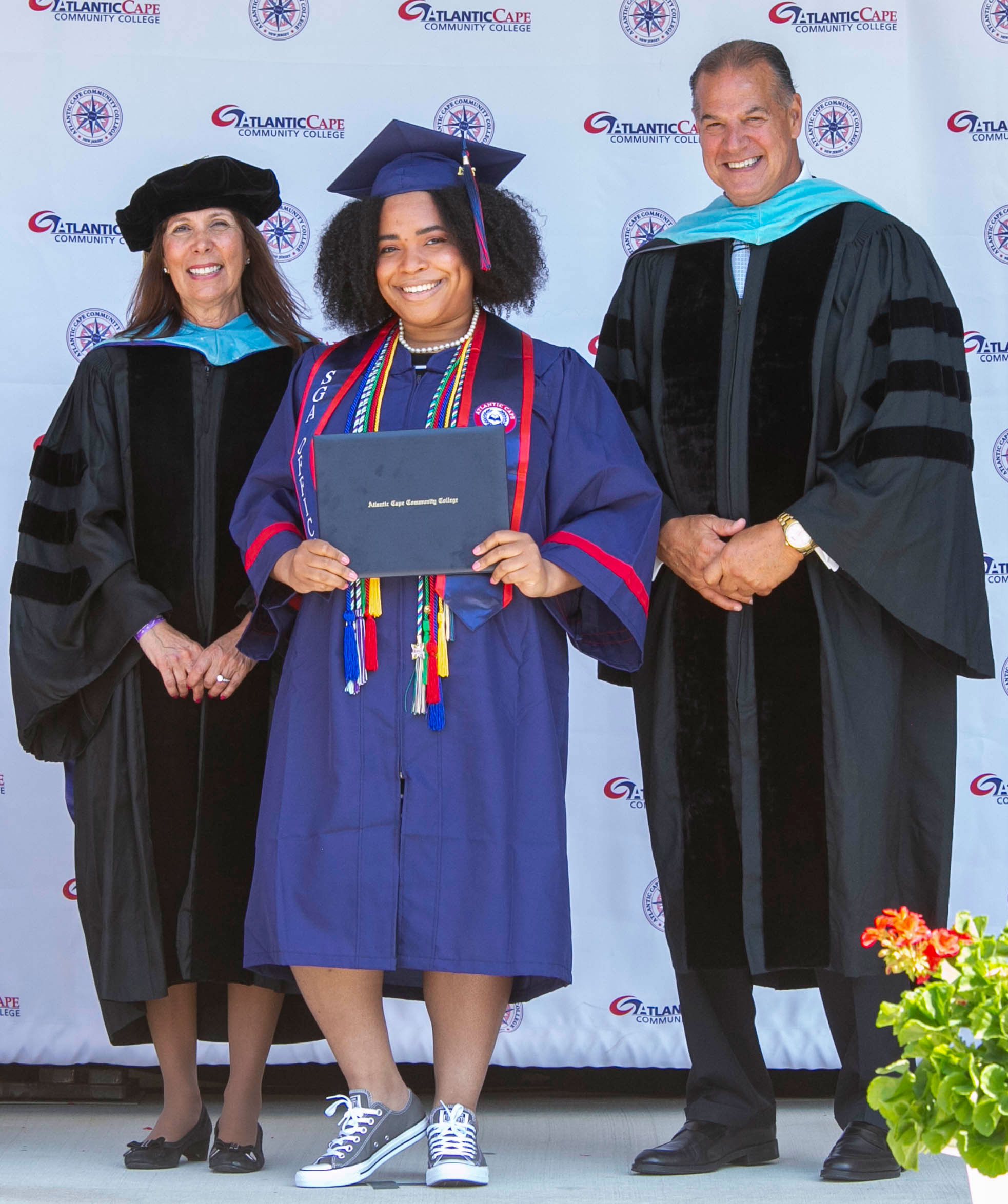 Students receiving their diplomas