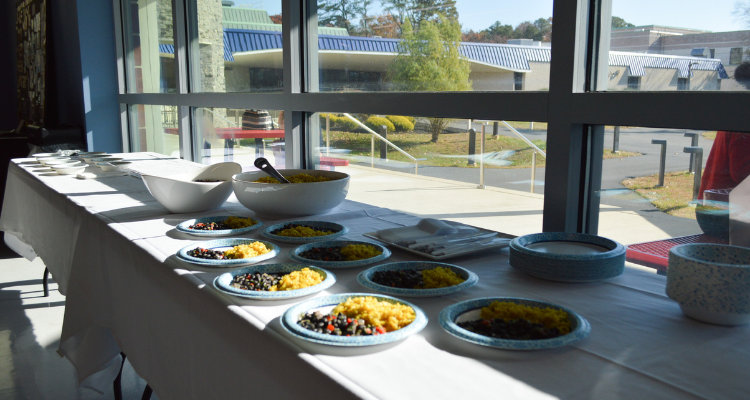 Food placed on a table at The Hunger Banquet