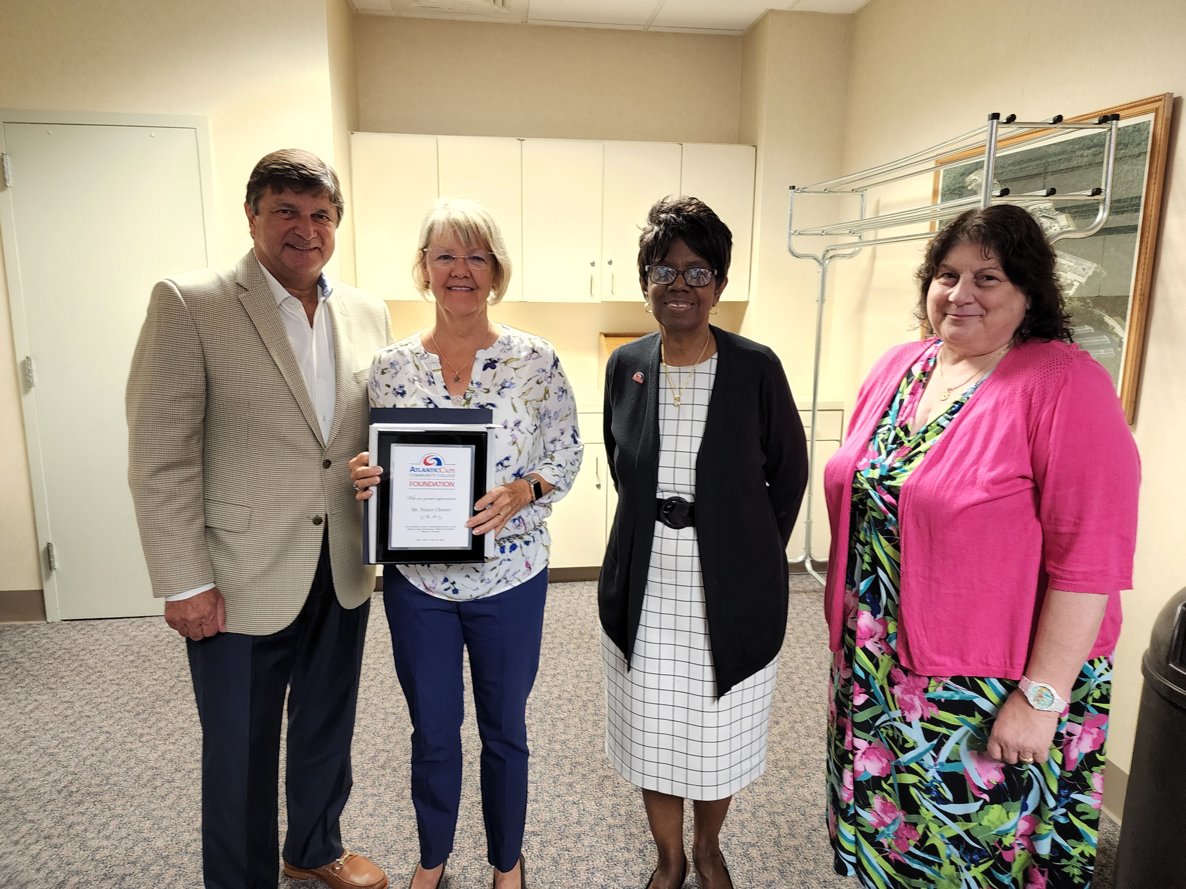 Atlantic Cape Foundation Board President James Rutala, retiring Foundation Board member Nancy Cleaver, Atlantic Cape Community College President Dr. Barbara Gaba and Atlantic Cape Foundation Associate Director Maria Kellett at the June 22, 2022 Foundation board meeting.