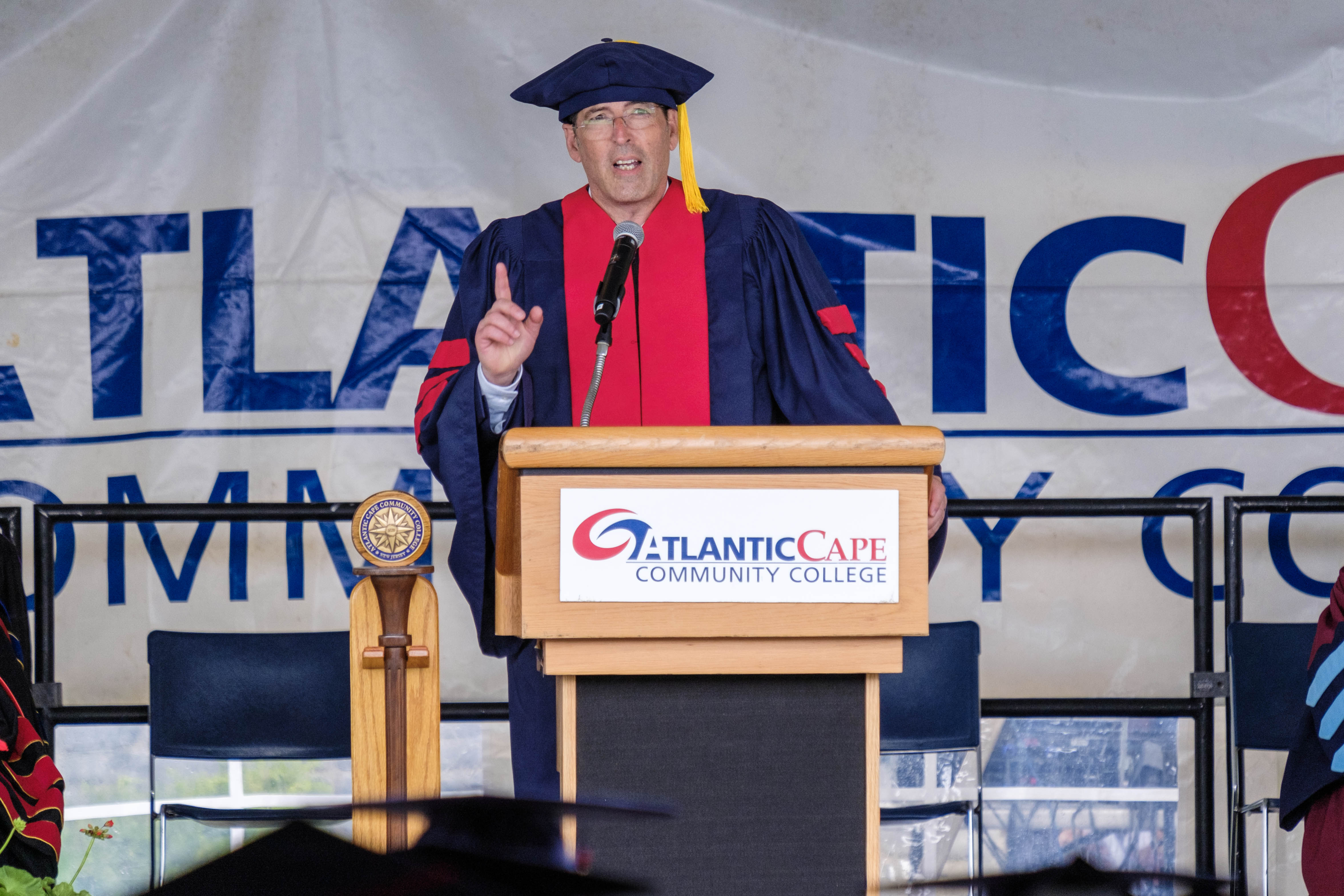 Keynote speaker Eric Scheffler speaks to the graduates at the 58th Annual Commencement ceremony