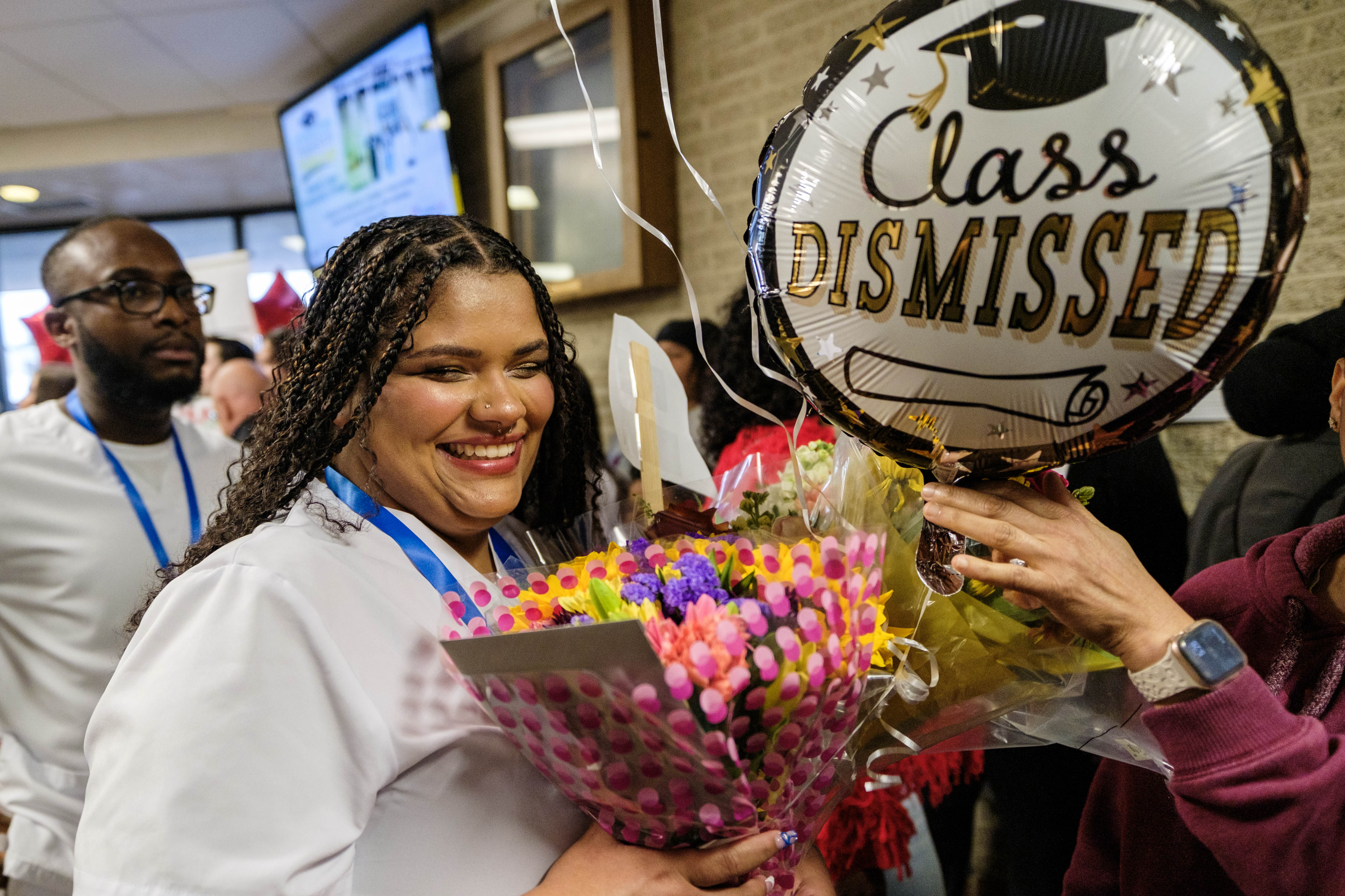 Graduate shows excitement at nurses pinning