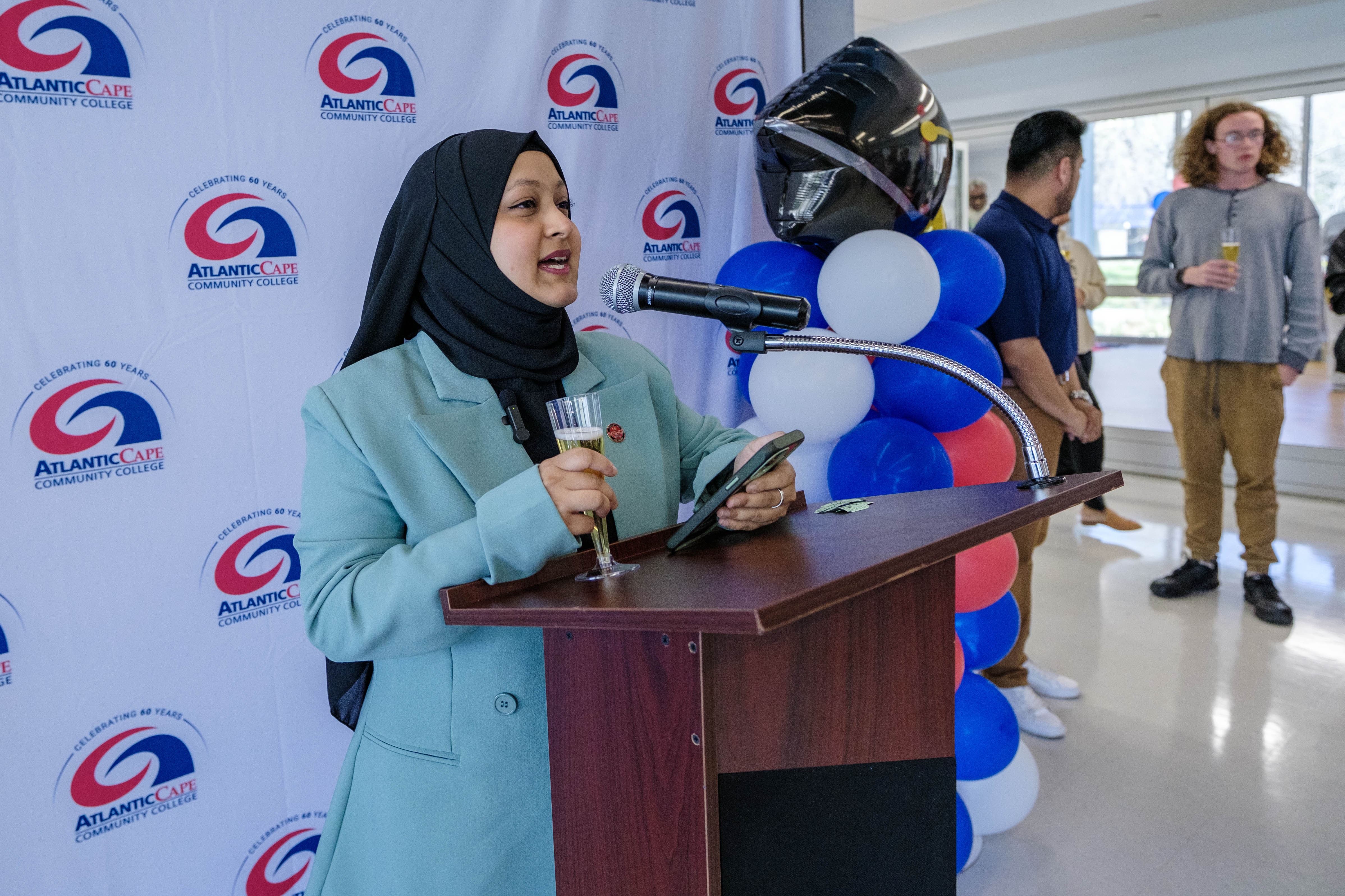 SGA President Sultana Zakia leads the Graduation Toast